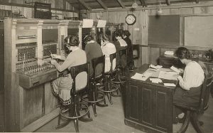 Figure 2: This image shows women working as telephone operators during the early 20th century.
